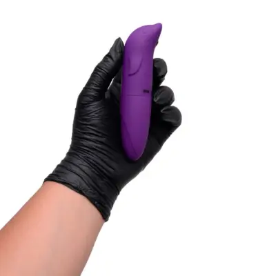 Vibrador aveludado com curvatura para ponto G e formato de golfinho.